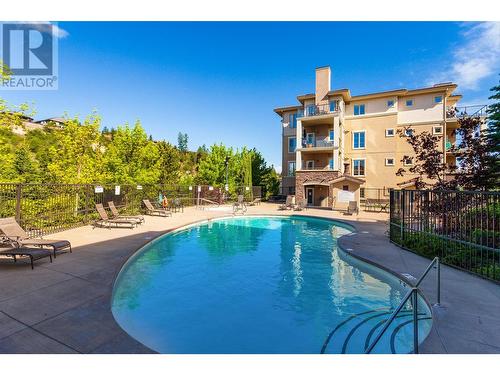 Resort Style Amenities at your doorstep - 1875 Country Club Drive Unit# 1414, Kelowna, BC - Outdoor With In Ground Pool