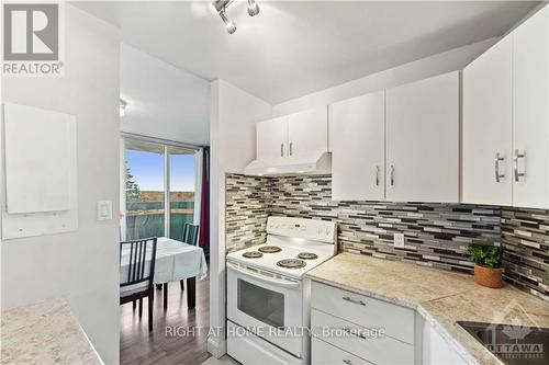 718 - 2000 Jasmine Crescent, Ottawa, ON - Indoor Photo Showing Kitchen With Double Sink