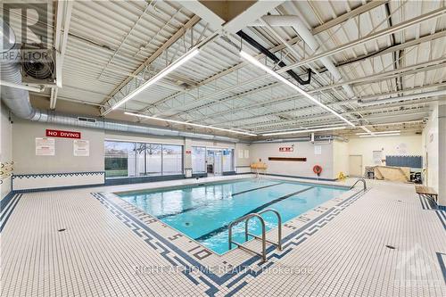 718 - 2000 Jasmine Crescent, Ottawa, ON - Indoor Photo Showing Other Room With In Ground Pool