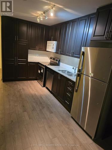 803 - 3091 Dufferin Street, Toronto, ON - Indoor Photo Showing Kitchen With Double Sink