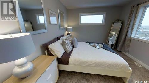 1 1070 Parr Hill Drive, Martensville, SK - Indoor Photo Showing Bedroom