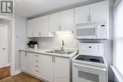 15 Empress Avenue, Hamilton, ON - Indoor Photo Showing Kitchen With Double Sink