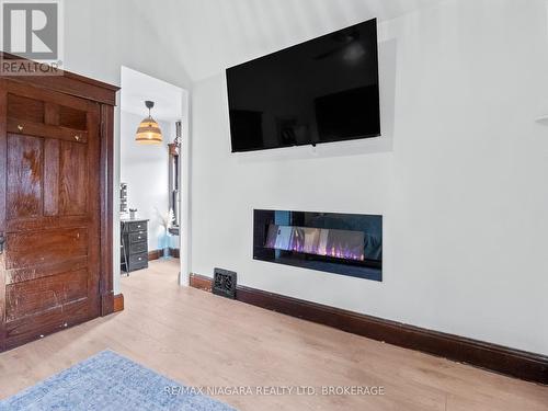 248 Dufferin Street, Fort Erie, ON - Indoor Photo Showing Living Room With Fireplace