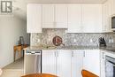 Quartz counters and backsplash. - 805 Carling Avenue Unit#708, Ottawa, ON  - Indoor Photo Showing Kitchen With Upgraded Kitchen 