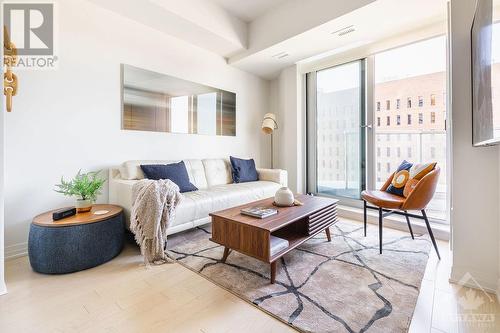 Bright space with large patio door. - 805 Carling Avenue Unit#708, Ottawa, ON - Indoor Photo Showing Living Room