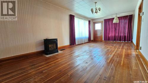 314 Railway Avenue, Neville, SK - Indoor Photo Showing Other Room With Fireplace