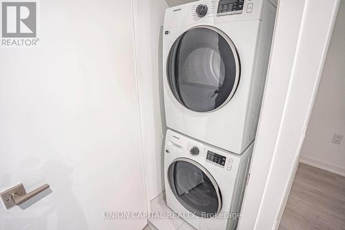 711 - 195 Mccaul Street, Toronto, ON - Indoor Photo Showing Laundry Room