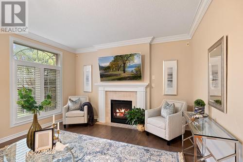 333 Rivertrace Close, London, ON - Indoor Photo Showing Living Room With Fireplace