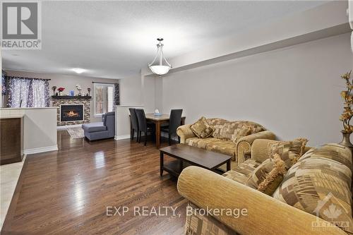 780 White Alder Avenue, Ottawa, ON - Indoor Photo Showing Living Room With Fireplace