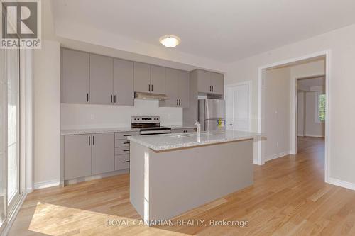 1453 National Common E, Burlington, ON - Indoor Photo Showing Kitchen With Double Sink