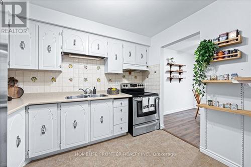 131 - 60 Hanson Road, Mississauga, ON - Indoor Photo Showing Kitchen With Double Sink