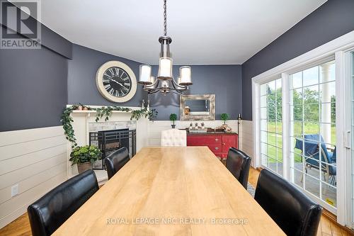 736 Chantler Road, Pelham (664 - Fenwick), ON - Indoor Photo Showing Dining Room With Fireplace