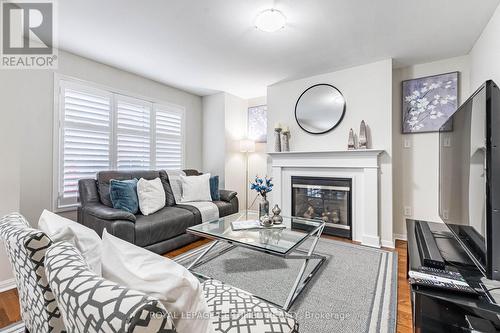 676 Speyer Circle, Milton, ON - Indoor Photo Showing Living Room With Fireplace