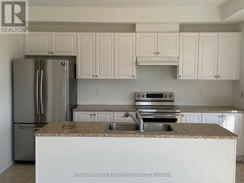 16 Feldspar Gate, Brampton, ON - Indoor Photo Showing Kitchen With Stainless Steel Kitchen With Double Sink With Upgraded Kitchen