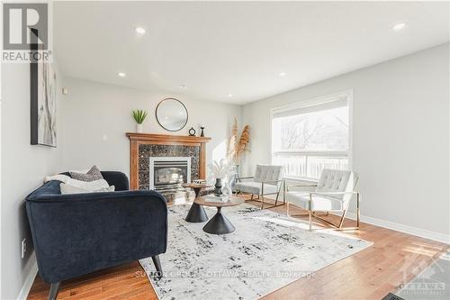 60 Rideaucrest Drive, Barrhaven (7710 - Barrhaven East), ON - Indoor Photo Showing Living Room With Fireplace