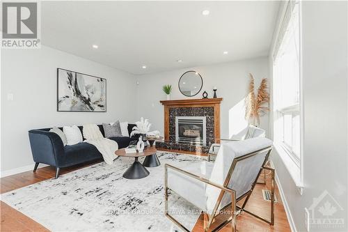 60 Rideaucrest Drive, Barrhaven (7710 - Barrhaven East), ON - Indoor Photo Showing Living Room With Fireplace