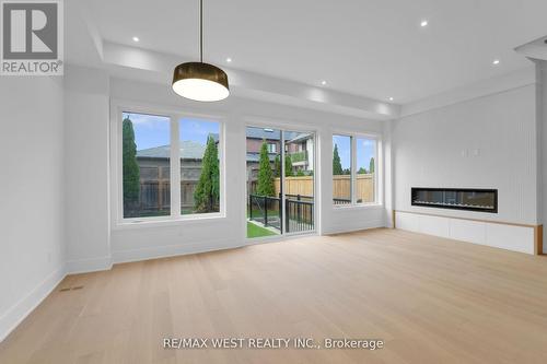 386A Rimilton Avenue, Toronto, ON - Indoor Photo Showing Other Room With Fireplace