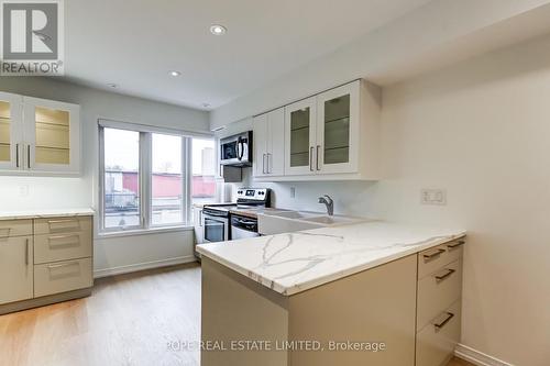 223 - 30 Merchant Lane, Toronto, ON - Indoor Photo Showing Kitchen