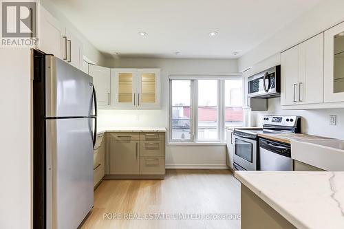 223 - 30 Merchant Lane, Toronto, ON - Indoor Photo Showing Kitchen