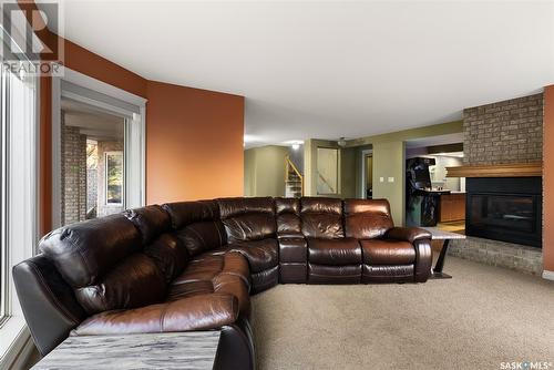 14 Park Bay, Emerald Park, SK - Indoor Photo Showing Living Room With Fireplace