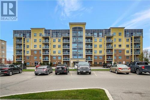 1419 Costigan Road Unit# 210, Milton, ON - Outdoor With Balcony With Facade