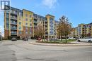 1419 Costigan Road Unit# 210, Milton, ON  - Outdoor With Balcony With Facade 