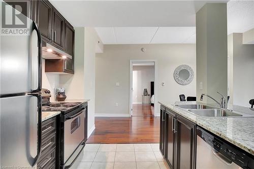 1419 Costigan Road Unit# 210, Milton, ON - Indoor Photo Showing Kitchen With Stainless Steel Kitchen With Double Sink With Upgraded Kitchen