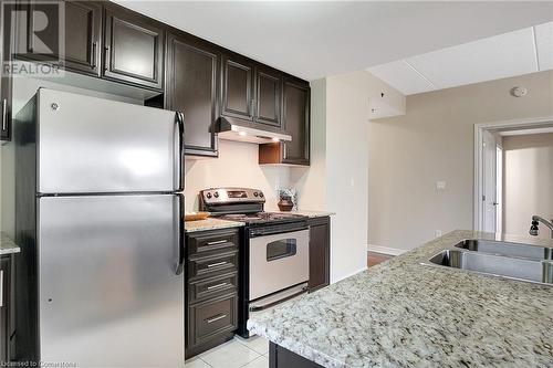 1419 Costigan Road Unit# 210, Milton, ON - Indoor Photo Showing Kitchen With Stainless Steel Kitchen