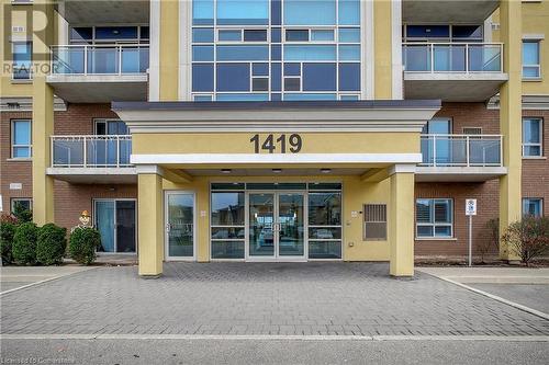 1419 Costigan Road Unit# 210, Milton, ON - Outdoor With Balcony With Facade