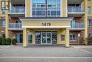 1419 Costigan Road Unit# 210, Milton, ON  - Outdoor With Balcony With Facade 