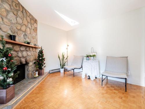 Family room - 1675 Crois. Sauvé, Brossard, QC - Indoor With Fireplace