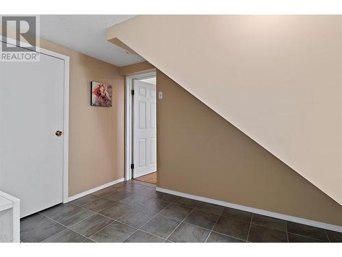 Floor 1 - Hall with separate entrance (access from lower patio) to Studio Suite - 1631 60 Street Ne, Salmon Arm, BC - Indoor Photo Showing Other Room