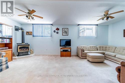 7724 Cortina Crescent, Niagara Falls (Ascot), ON - Indoor Photo Showing Living Room With Fireplace