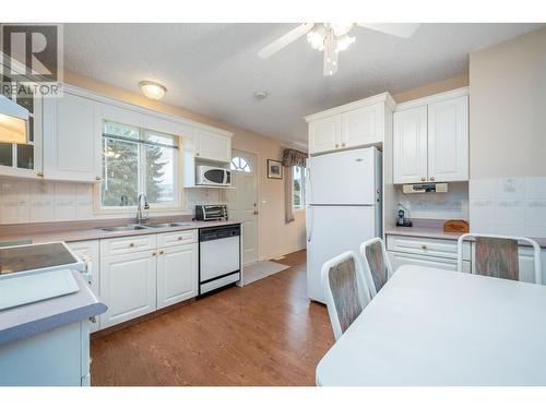 Kitchen - 1251 Ortt Place, Kelowna, BC - Indoor Photo Showing Kitchen With Double Sink