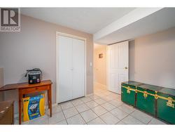 Fourth bedroom downstairs w/closet and window (currently used for storage) - 