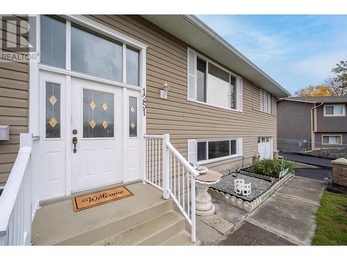 Lovely welcoming front entrance! - 1251 Ortt Place, Kelowna, BC - Outdoor With Deck Patio Veranda