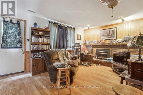 9 Juniper Place, Lambton Shores (Forest), ON - Indoor Photo Showing Living Room With Fireplace