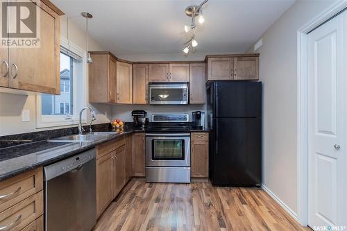 512 303 Slimmon Place, Saskatoon, SK - Indoor Photo Showing Kitchen With Stainless Steel Kitchen