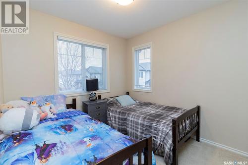 512 303 Slimmon Place, Saskatoon, SK - Indoor Photo Showing Bedroom