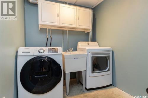 512 303 Slimmon Place, Saskatoon, SK - Indoor Photo Showing Laundry Room