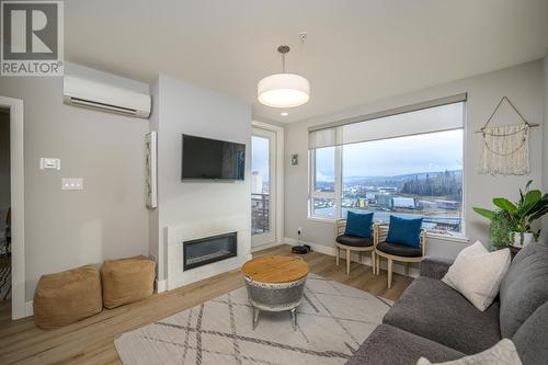 404 1087 6Th Avenue, Prince George, BC - Indoor Photo Showing Living Room With Fireplace