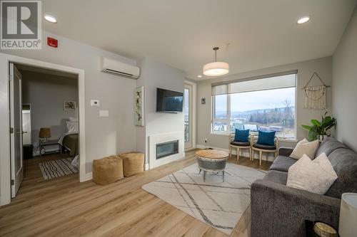 404 1087 6Th Avenue, Prince George, BC - Indoor Photo Showing Living Room With Fireplace