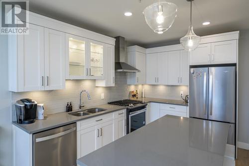 404 1087 6Th Avenue, Prince George, BC - Indoor Photo Showing Kitchen With Double Sink With Upgraded Kitchen