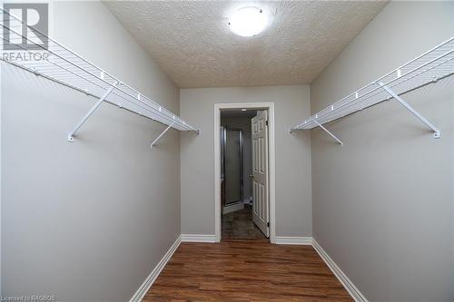 Spacious closet with dark hardwood / wood-style floors - 2555 3Rd 3Rd Avenue Avenue W Unit# 210, Owen Sound, ON - Indoor With Storage