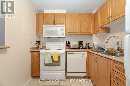 512 - 6720 Glen Erin Drive, Mississauga, ON - Indoor Photo Showing Kitchen With Double Sink