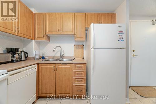 512 - 6720 Glen Erin Drive, Mississauga, ON - Indoor Photo Showing Kitchen With Double Sink