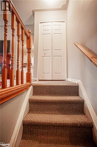 Stairs with a textured ceiling - 96 Sixth Street, Midland, ON - Indoor Photo Showing Other Room