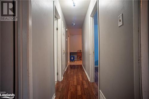 Hall featuring dark hardwood / wood-style flooring - 96 Sixth Street, Midland, ON - Indoor Photo Showing Other Room