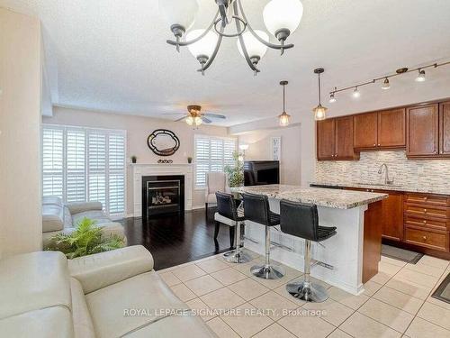 5015 Dubonet Dr, Mississauga, ON - Indoor Photo Showing Kitchen With Fireplace With Upgraded Kitchen