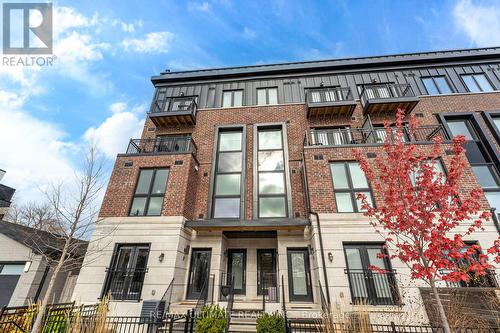 11 - 100 Coxwell Avenue, Toronto, ON - Outdoor With Facade